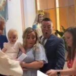 Bimba ferma il battesimo, l’esilarante razione dei genitori VIDEO